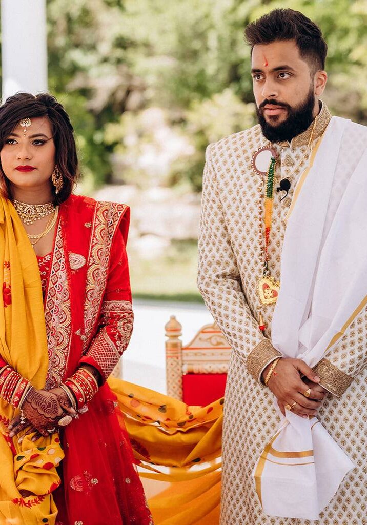 pallavi-sid2-1024X1024 Bride in red and gold and groom in embroidered ivory at their wedding ceremony